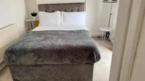 Spacious 5 Bedroom House Close To Town Center